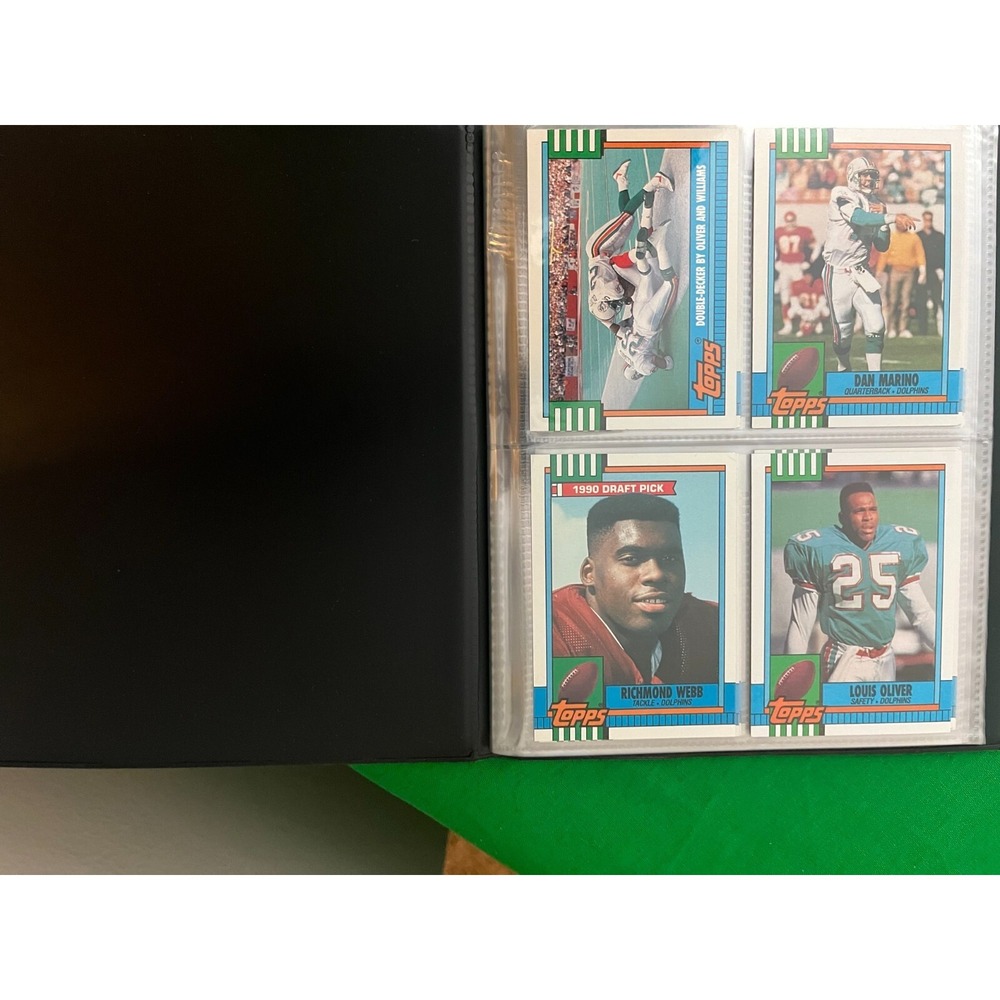 Miami Dolphins 1990 Topps Team Set with 40 card collector album.